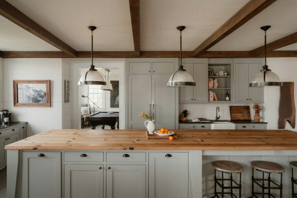 12 Popular Home Interior Design Types Explained (How to Find Your Style) modern farmhouse kitchen with Creamy whites, soft greiges,