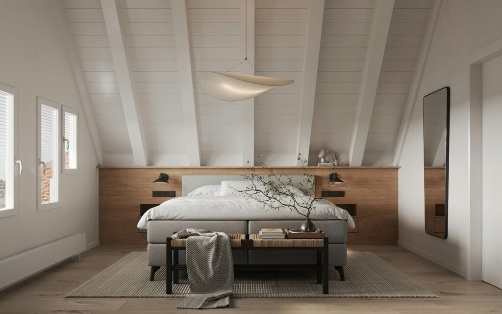 12 Popular Home Interior Design Types Explained (How to Find Your Style) scandinavian interior bedroom in whie and grey tones with wood accents and a mirror on the wall
