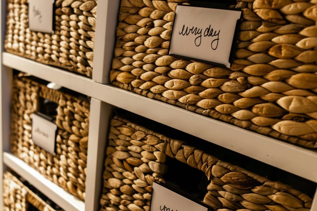 labeled woven baskets organized on shelves