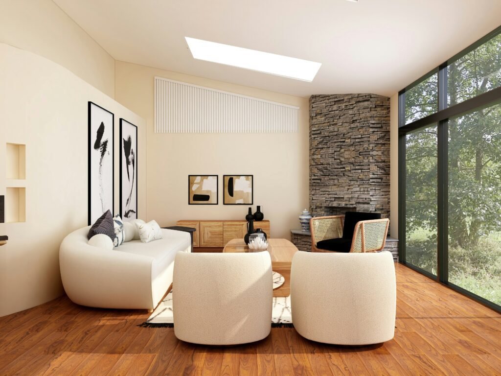 organic modern sitting room/living room area with curved furniture and a stone fireplace and nice artwork on the walls with floor to ceiling windows 