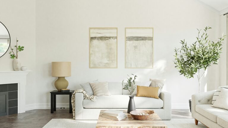 A neutral toned living room with plants