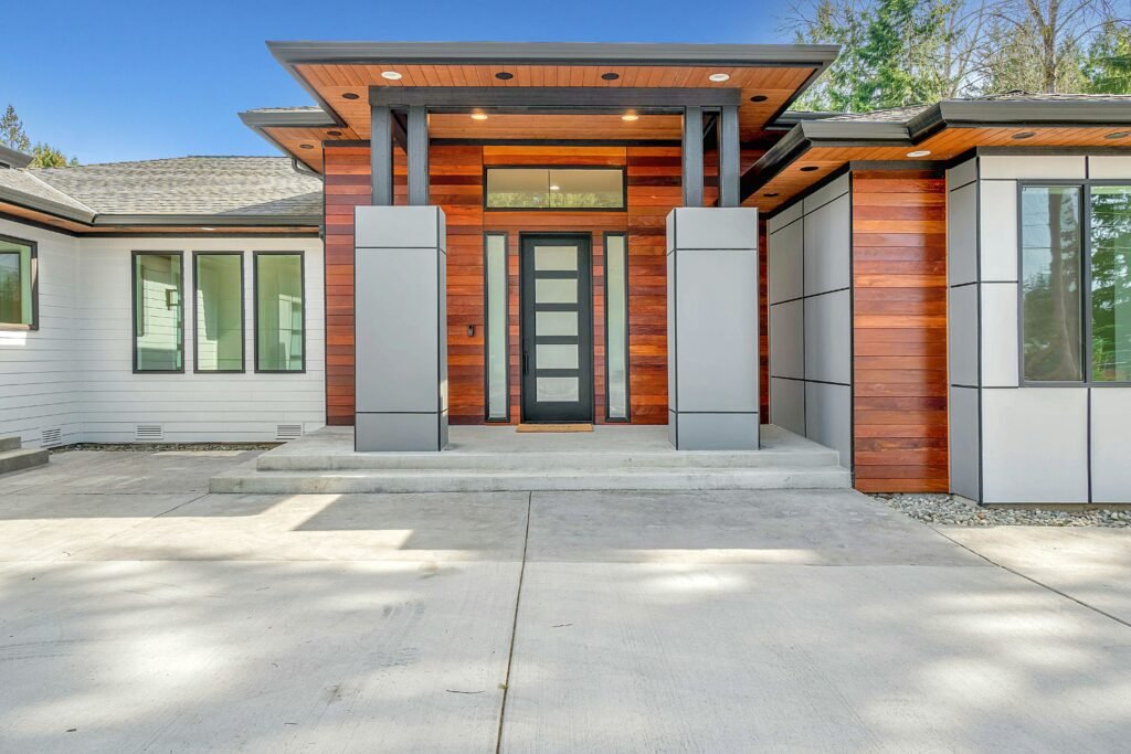 a contemporary home exterior with wood elements