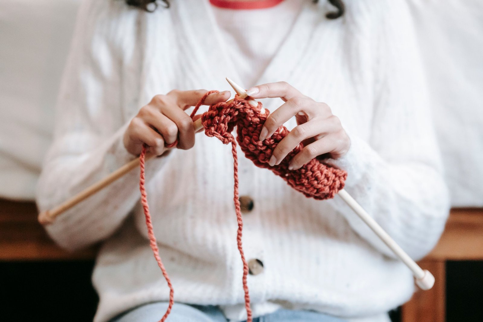 hands doing some knitting