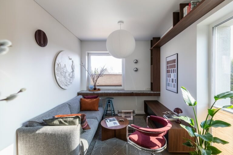 ia small room with a plant and natural light